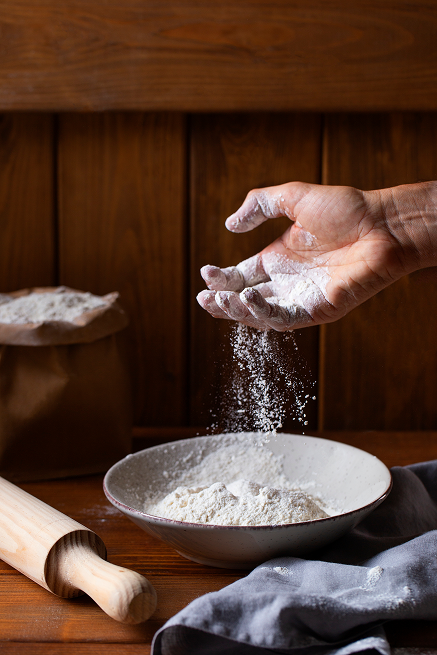 person-cooking-with-flour